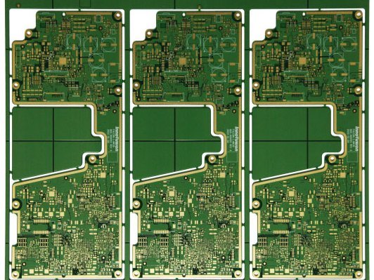 Circuit board with machined cut-outs and slotted edges on a white background